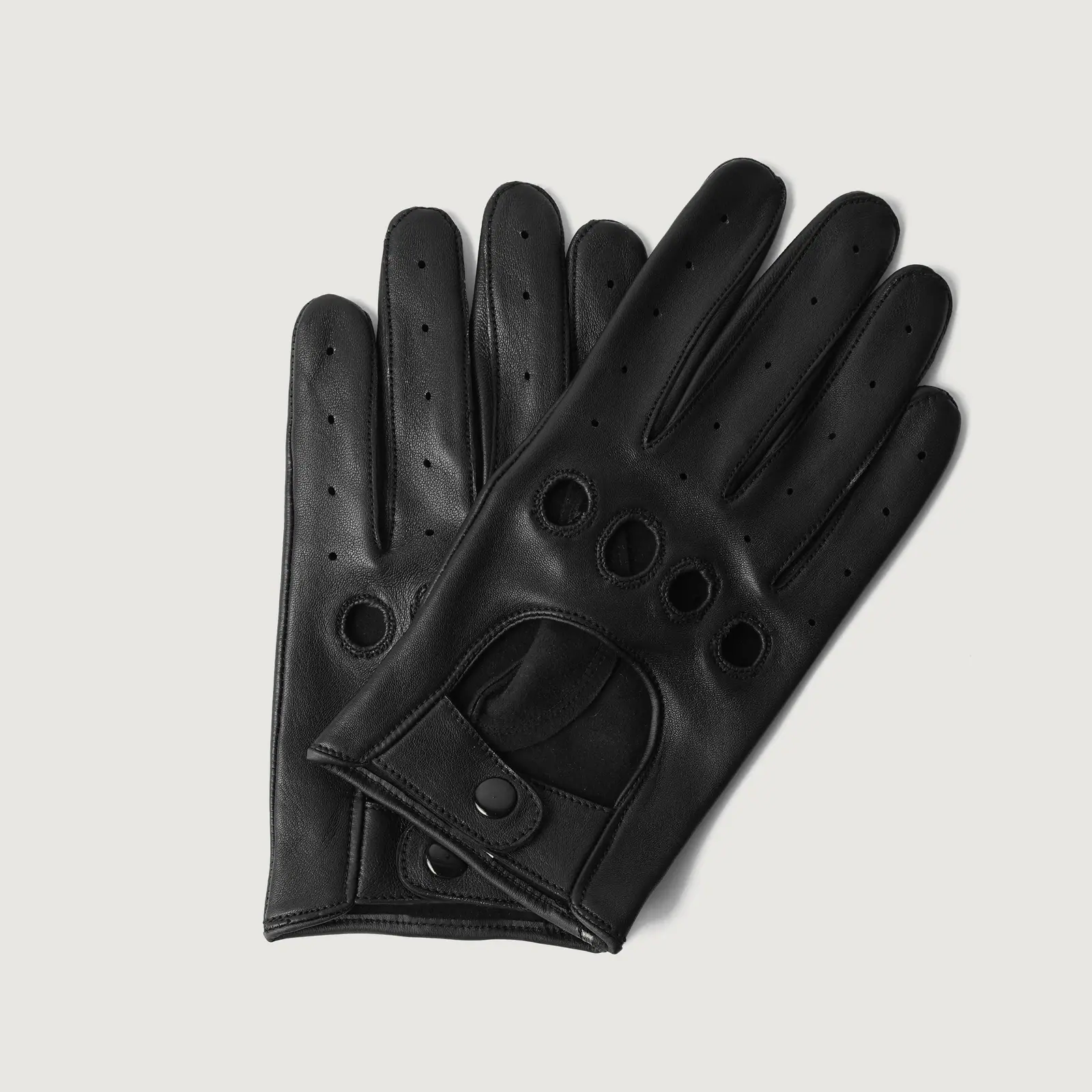 Black perforated driver gloves with button cuffs